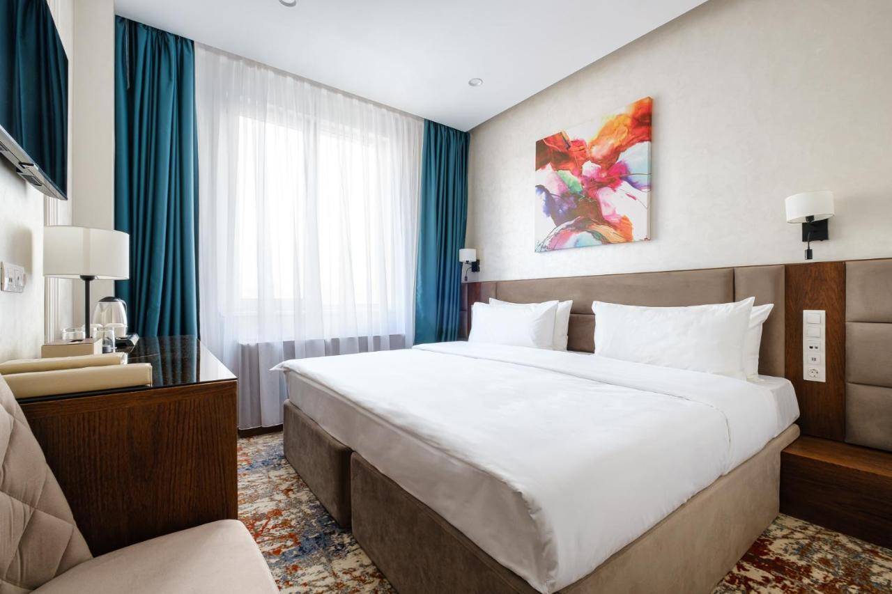 Grand Mildom Hotel Алма Ата Екстериор снимка