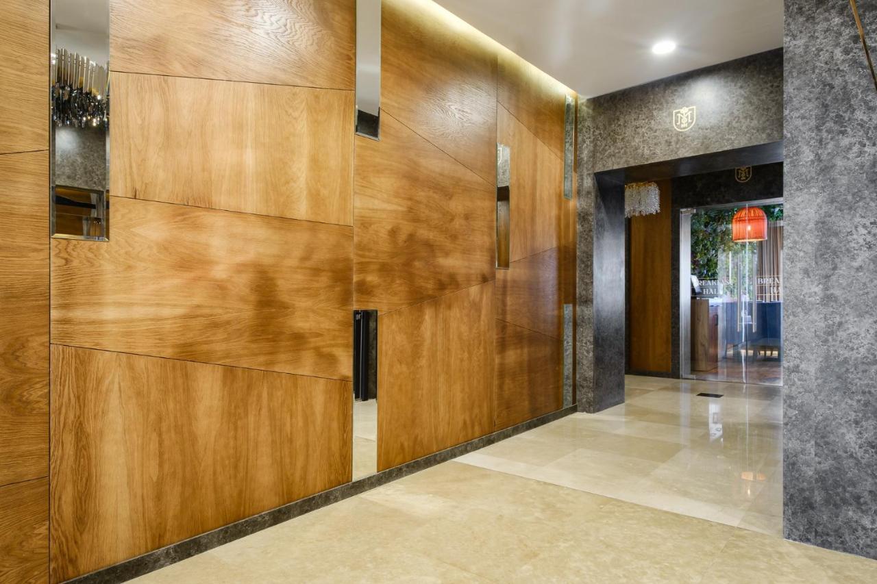 Grand Mildom Hotel Алма Ата Екстериор снимка