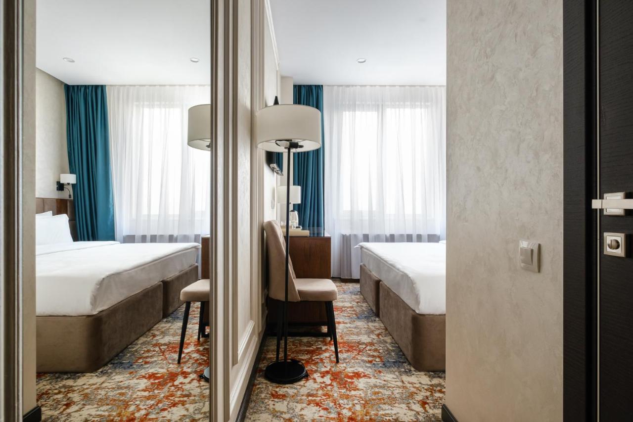 Grand Mildom Hotel Алма Ата Екстериор снимка